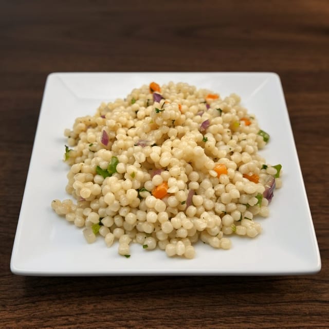 Side Cous cous with veggies.