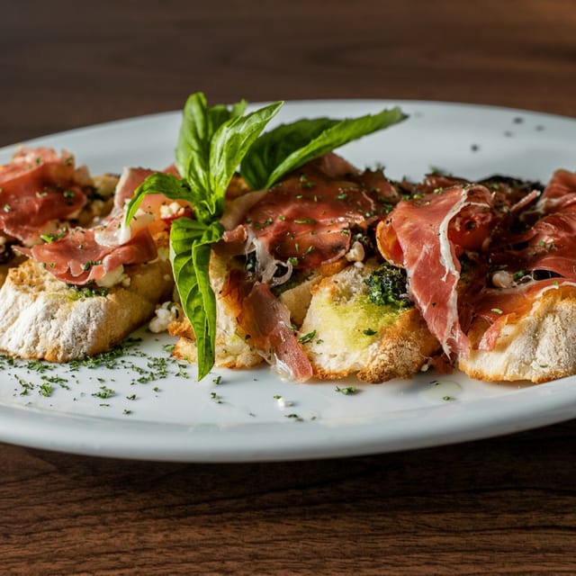 Prosciutto E Capra.